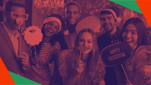 A group of employees enjoying a Christmas party with props